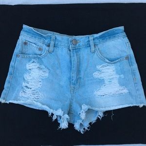 Blue ripped jean shorts.